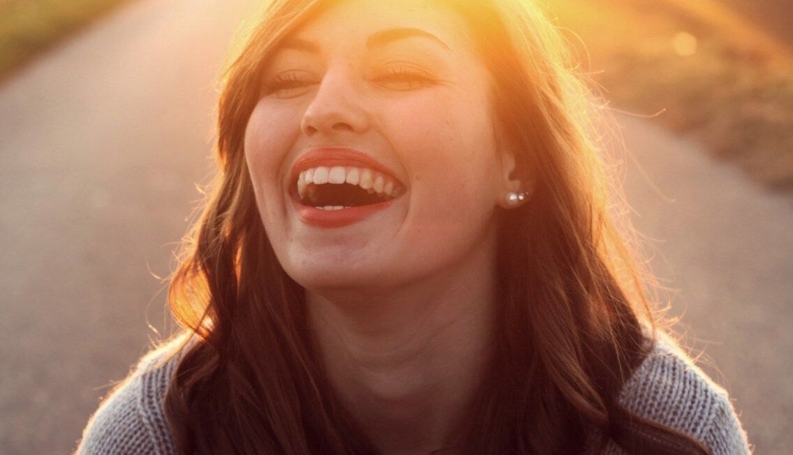 Happy girl laughing