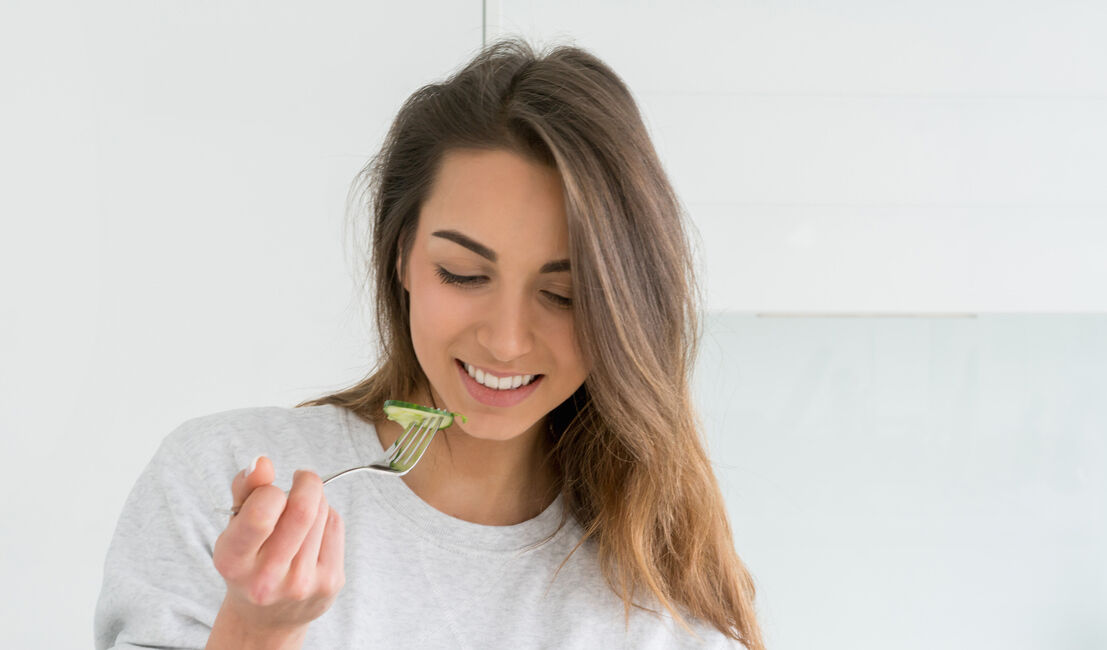 Woman dieting and eating a salad