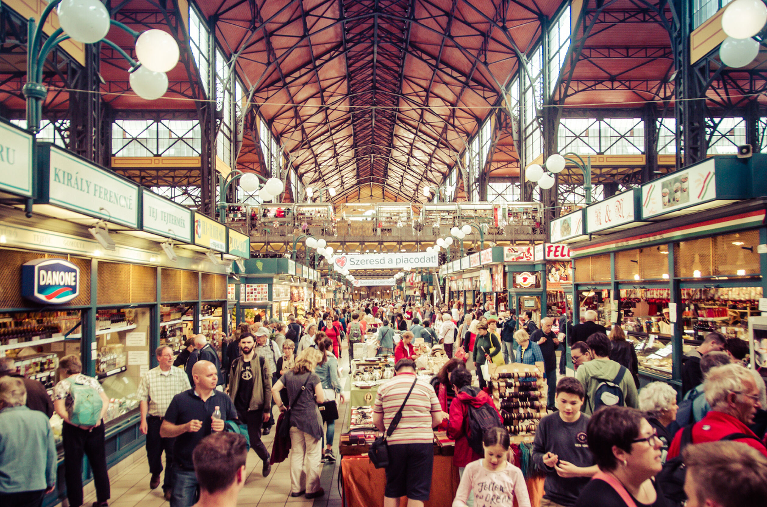 Budapest, Hungary - May 26, 2015: Shoppers and tourists wander the main market hall in Budapest, Hungary.