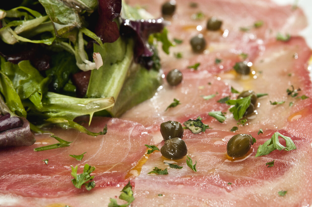 Thin sliced Tuna carpaccio close up