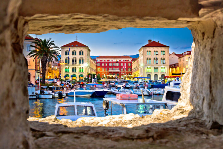 Prokurative square in Split through stone window