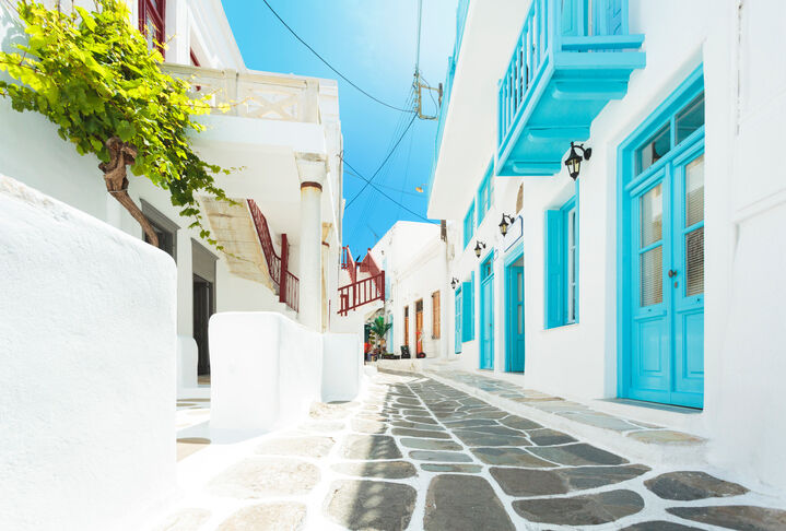 Narrow street in Mykonos, Greece.