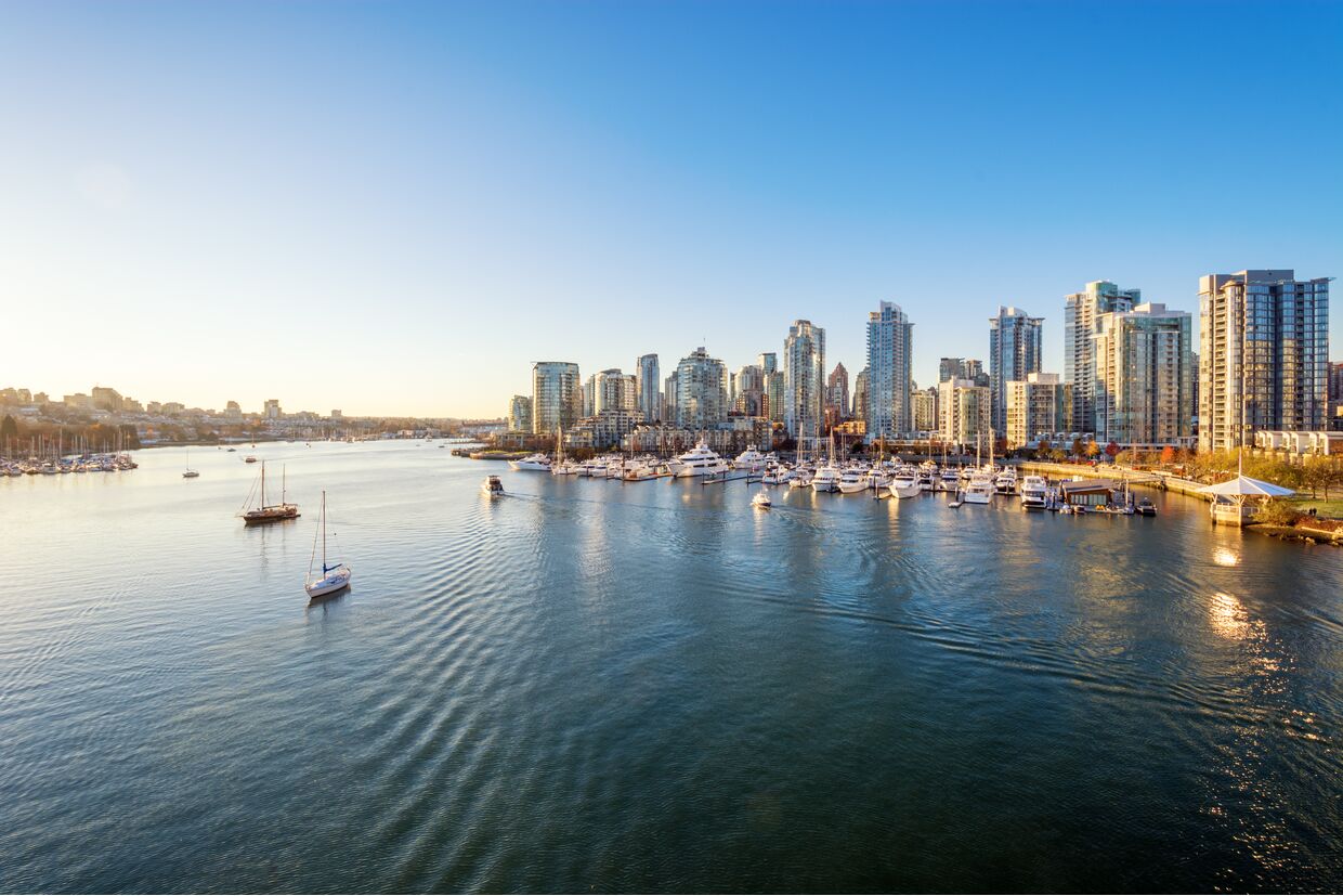 View from the Cambie Bridge. Downtown skyline in Vancouver, Canada.