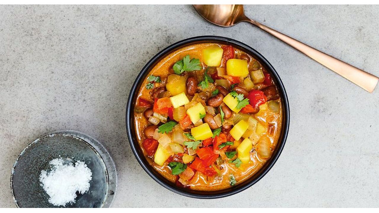 Illustratie voor: Dit heerlijke Caribbean Jerk Chili recept laat je verlangen naar de zomer