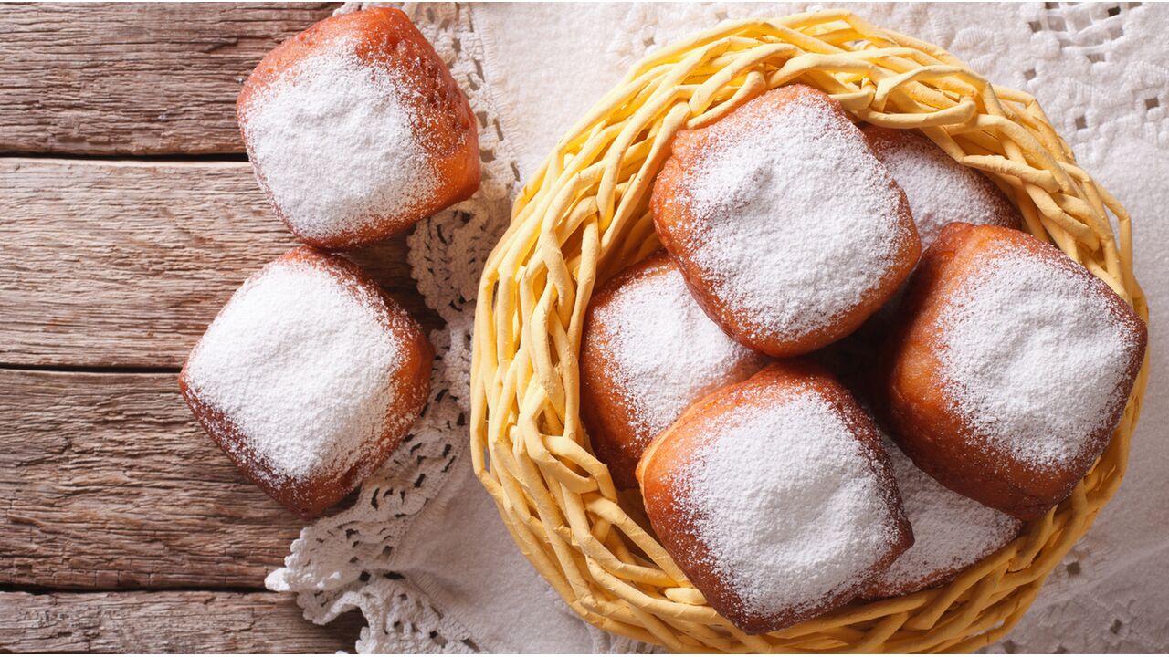 Illustratie voor: Het is Beignet dag en in Amsterdam worden ze gratis uitgedeeld!