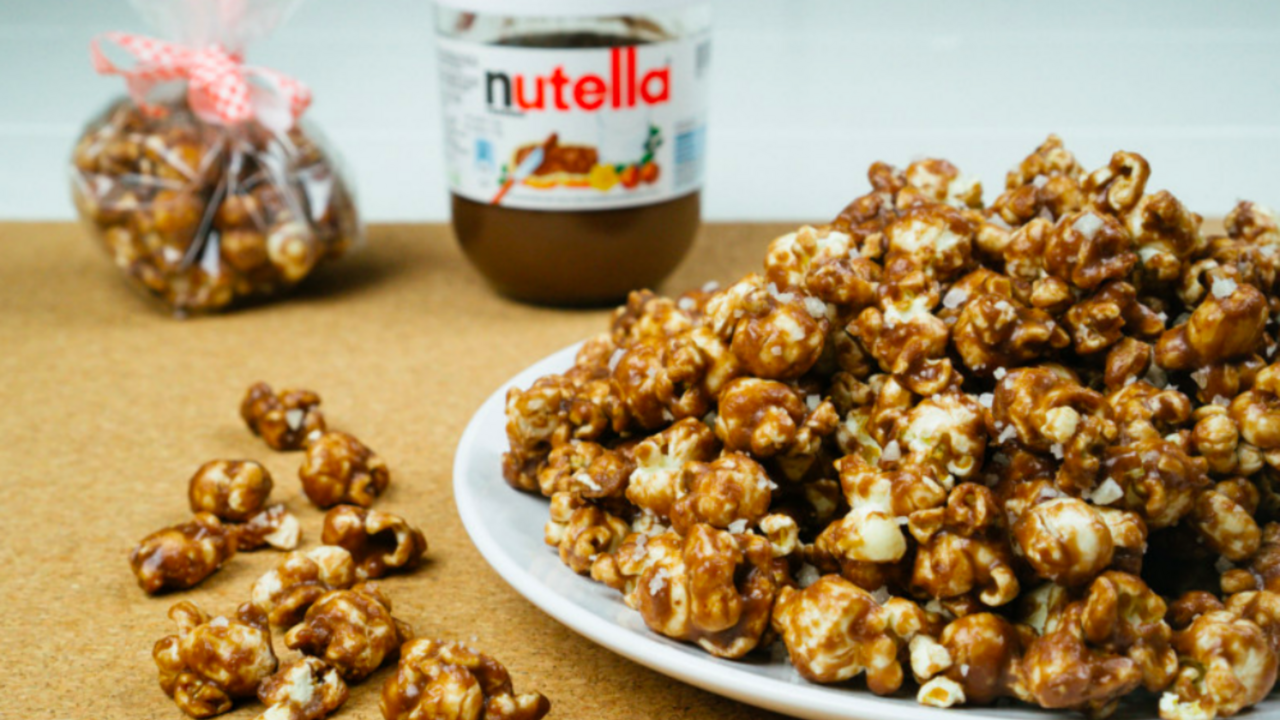 Illustratie voor: Ultieme snack: Nutella popcorn met pindakaas en zeezout