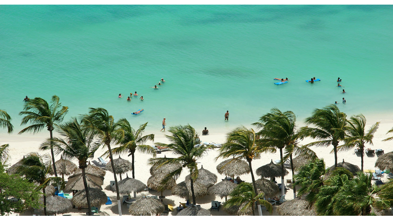 Illustratie voor: Klaar met thuiswerken? Je kunt nu op workation naar Aruba