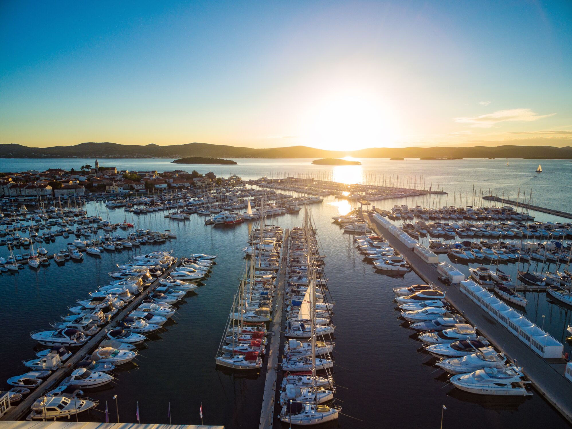 Biograd na moru town and marina with sailboats from above