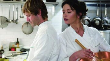 Man en vrouw in de keuken samen.