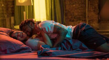 Man en vrouw op bed.