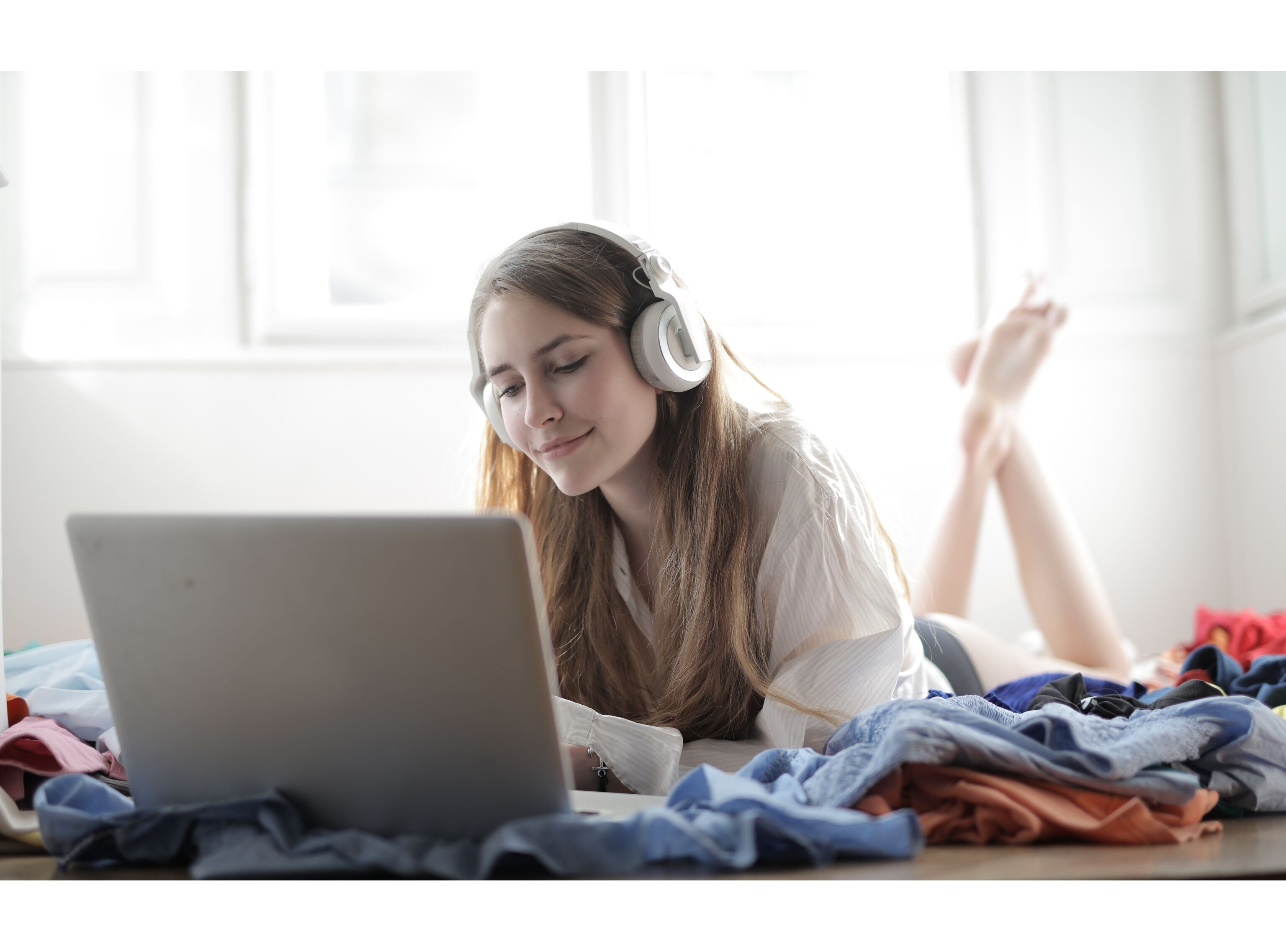 woman-in-white-shirt-using-silver-macbook-3794188