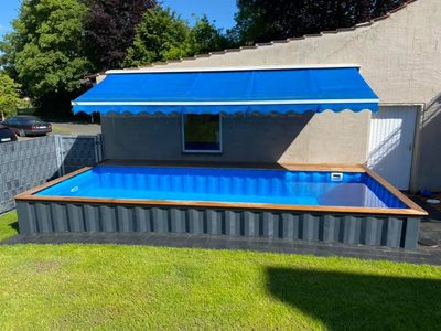 Illustratie voor: Do it yourself: deze man bouwt containerzwembad in achtertuin