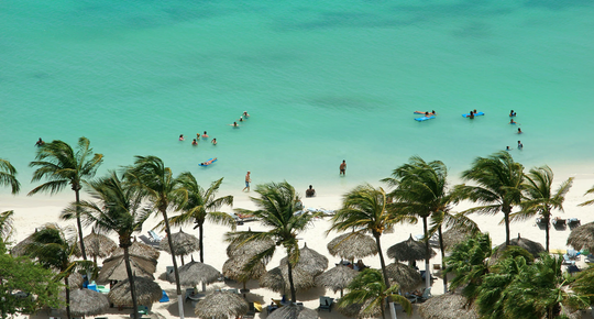 Illustratie voor: Klaar met thuiswerken? Je kunt nu op workation naar Aruba