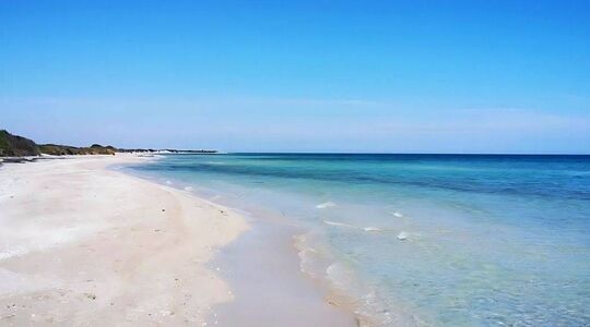 Italiaanse strand dat op de Malediven lijkt