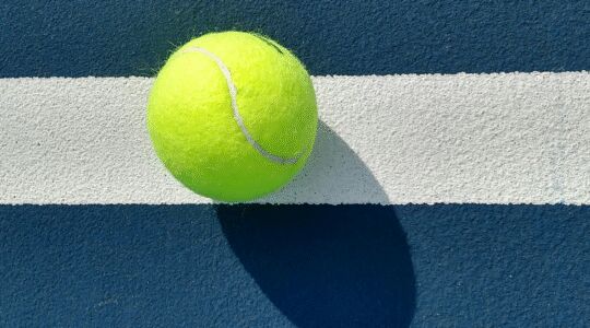 tennisbal in je handbagage