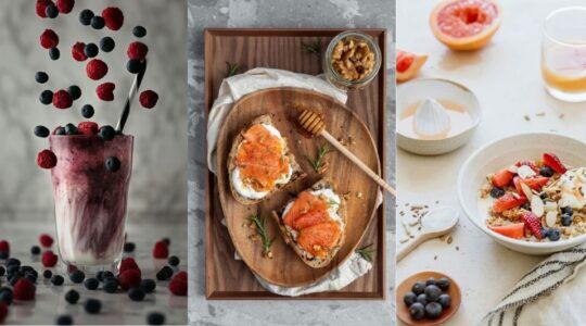 Smoothie met fruit, toast met zalm en een yoghurt bowl naast elkaar.