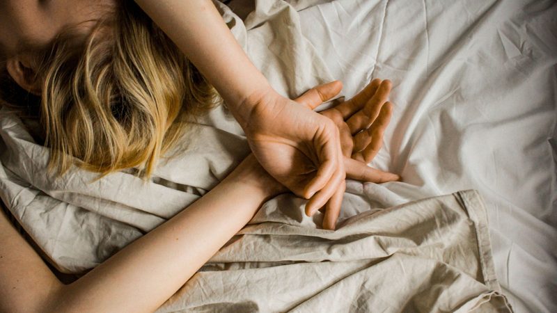 Vrouw in bed.