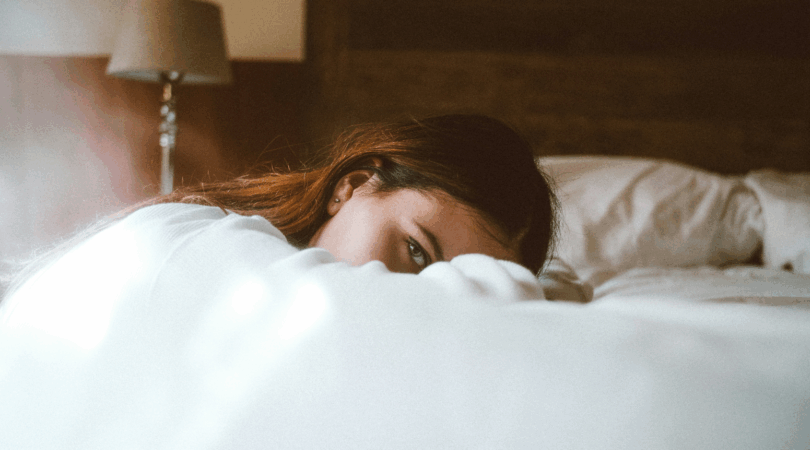 Vrouw in bed.