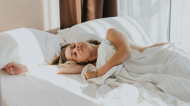 Vrouw in bed.